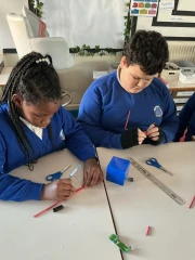 Year 6 Children making 3D cubes in DT  with straws