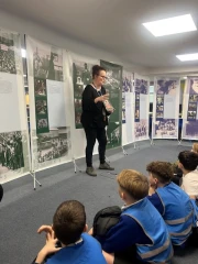 Children listening to an extract from the diary