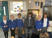 'Captain Oates' posing with some Year 2 children