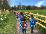 Children walking to the farm