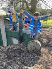 children in the playground at the farm