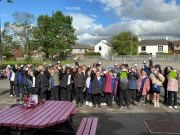 children holding plant pots